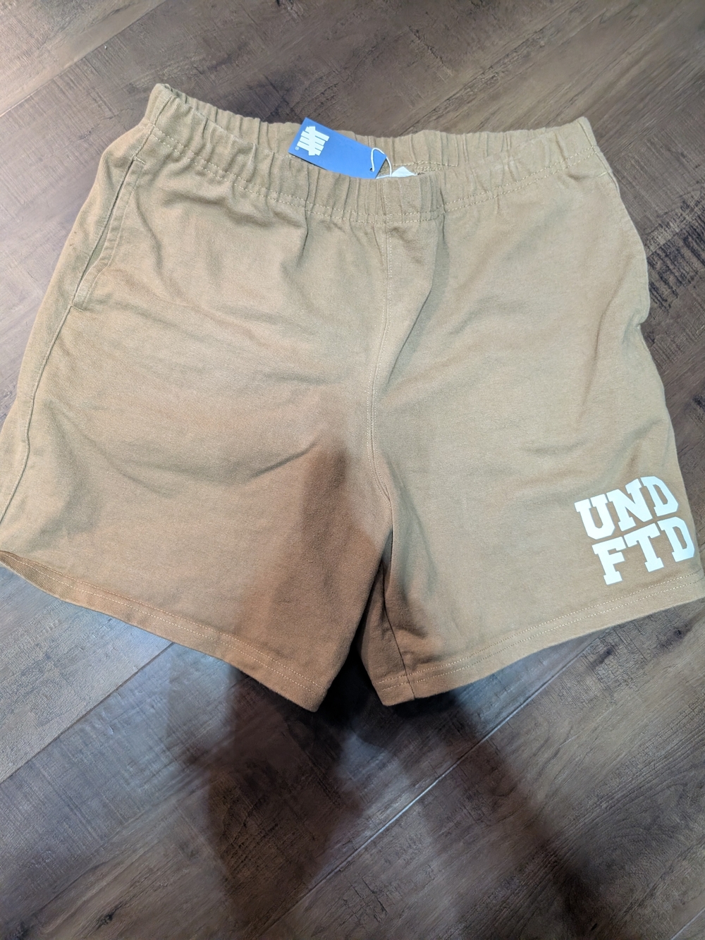 Undefeated Tan Athletic Shorts with Double Logo